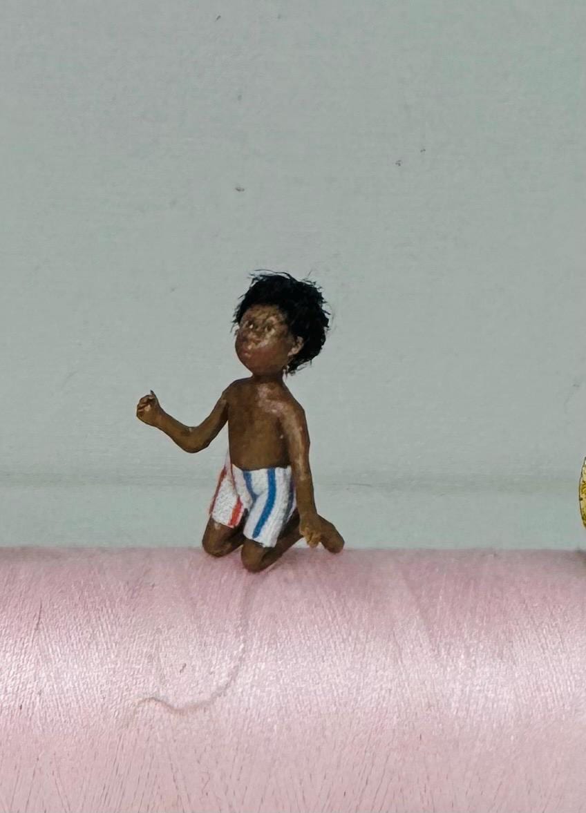 Miniature polymer clay ooak boy toy dolly 1:48 scale dollhouse micro dolly art doll handmade by Lana Hallas.